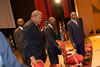 The G-77 Chair, The Honourable W. Baldwin Spencer (left), Prime Minister and Minister for Foreign Affairs of Antigua and Barbuda, and His Excellency Mr. Laurent Gbagbo, President of the Republic of C�te d'Ivoire, taking their seats at the podium during the opening ceremony of IFCC-XII.